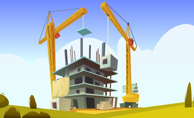 dwa żurawie na placu budowy budynku z gotowych modułów